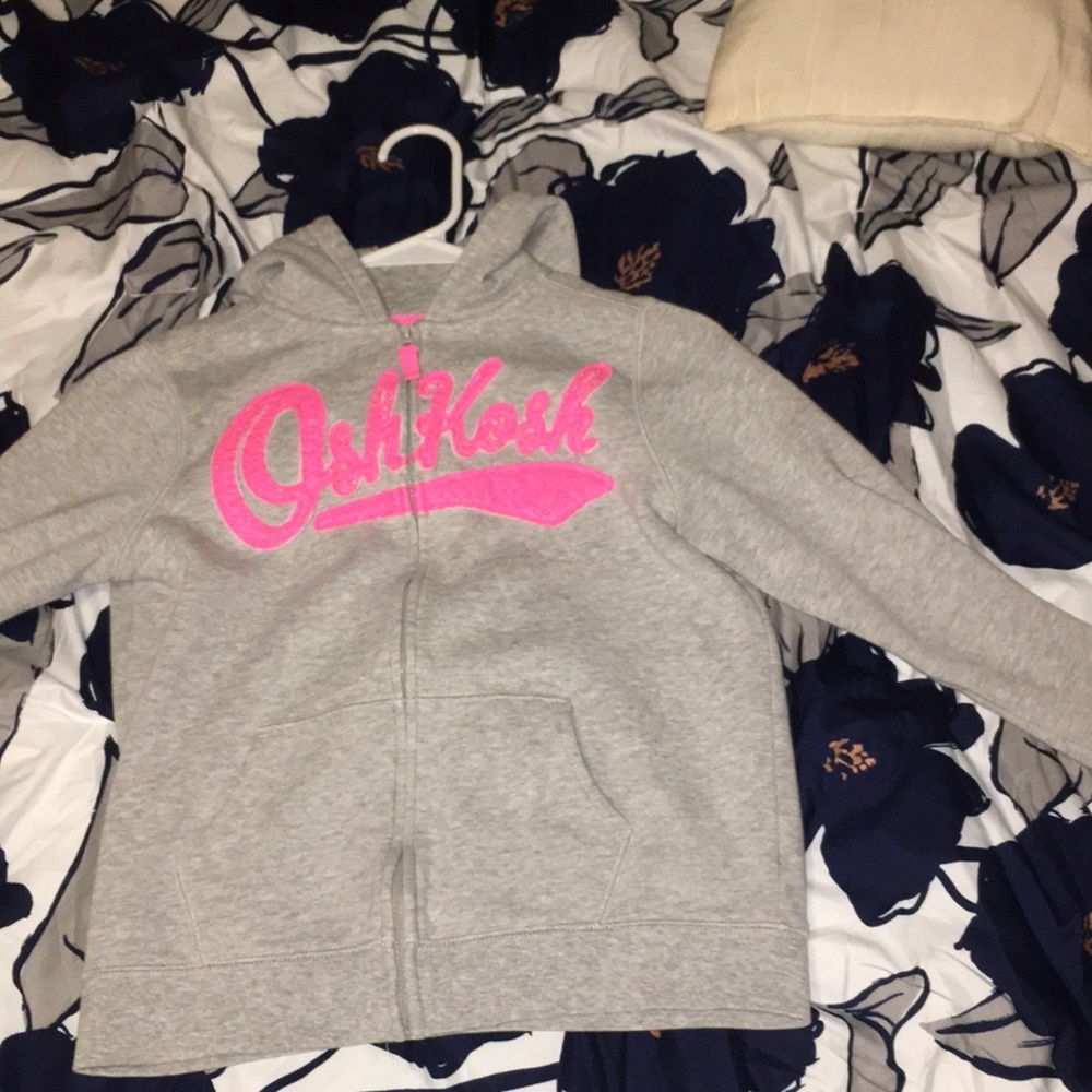 A girls Oshkosh sweater